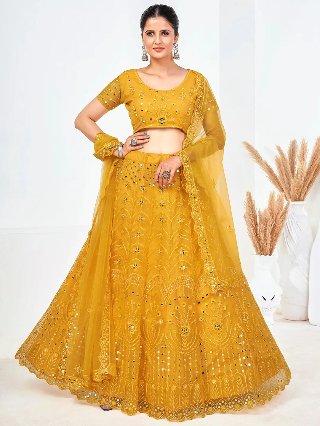 Yellow Sequins Embroidered Soft Net Festival Special Lehenga Choli