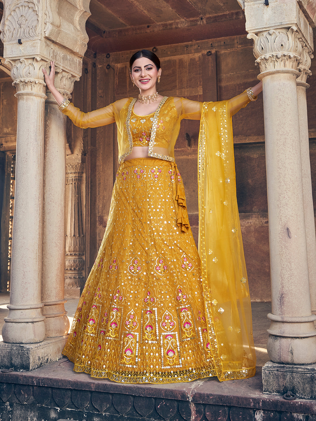 Desirable Mustard Yellow Soft Net Sequence Embroidered Eid Special Lehenga Choli