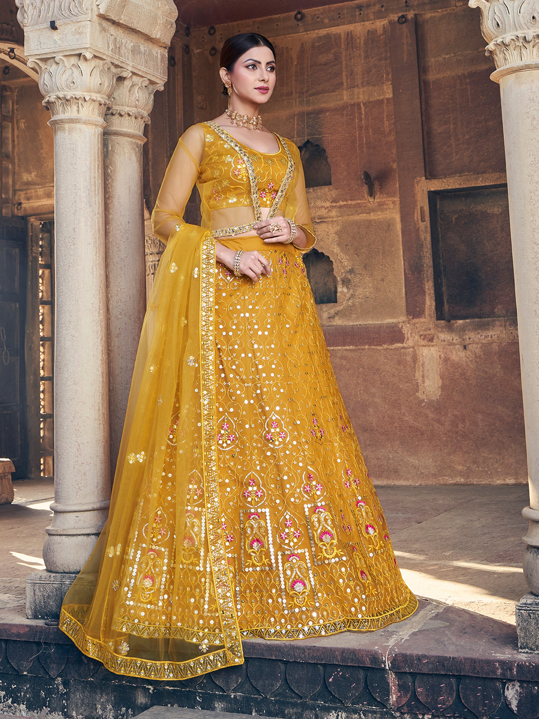 Desirable Mustard Yellow Soft Net Sequence Embroidered Eid Special Lehenga Choli
