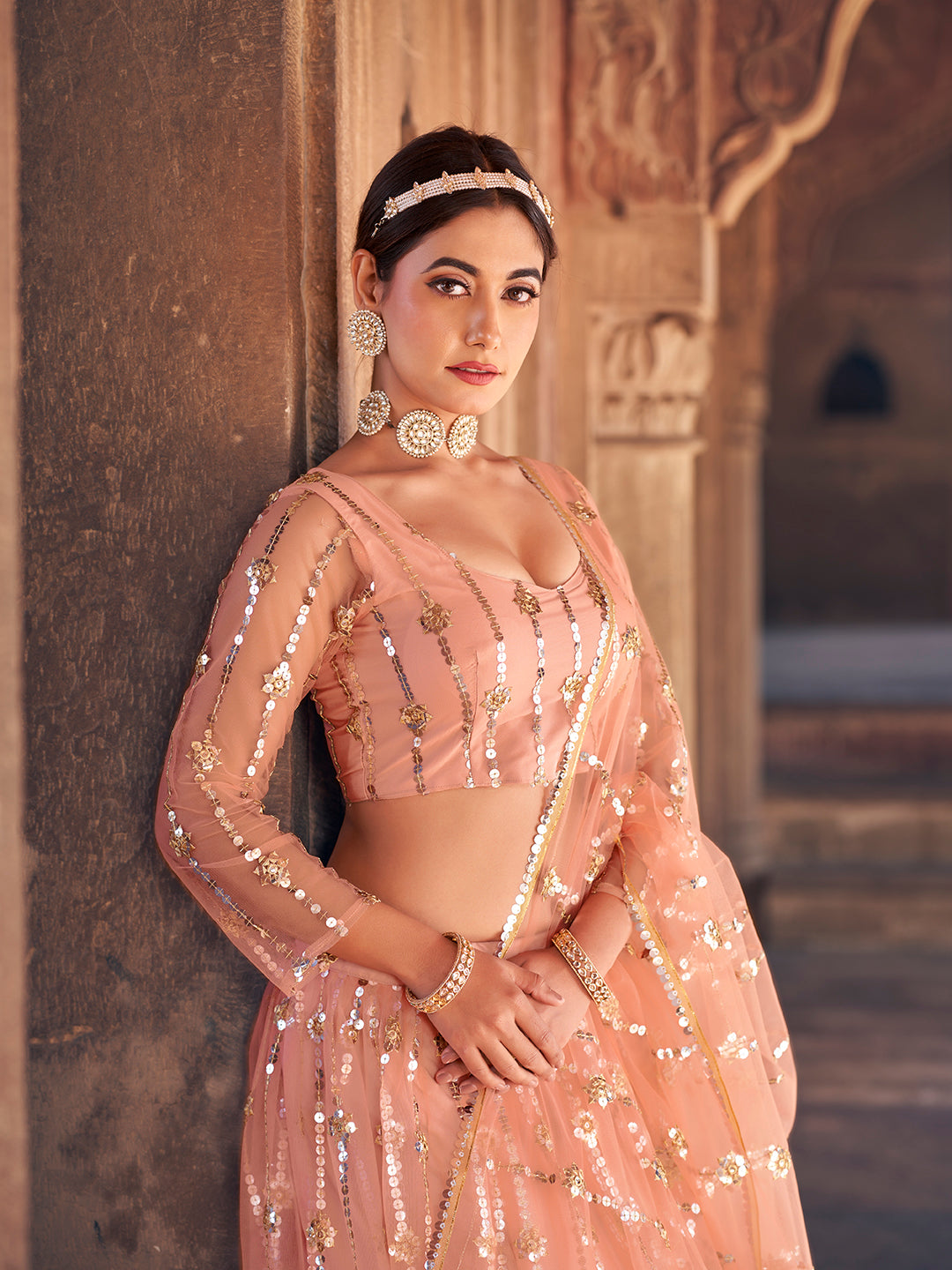 Lovely Peach Color Sequence Embroidered Soft Net Lehenga Choli Set For Women