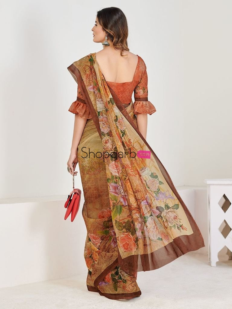 Stylish Beige And Brown Georgette Floral Printed Casual Wear Saree With Blouse