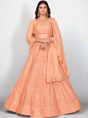 Decorative Orange and Silver Toned Embroidered Sangeet Special Lehenga and Blouse With Dupatta