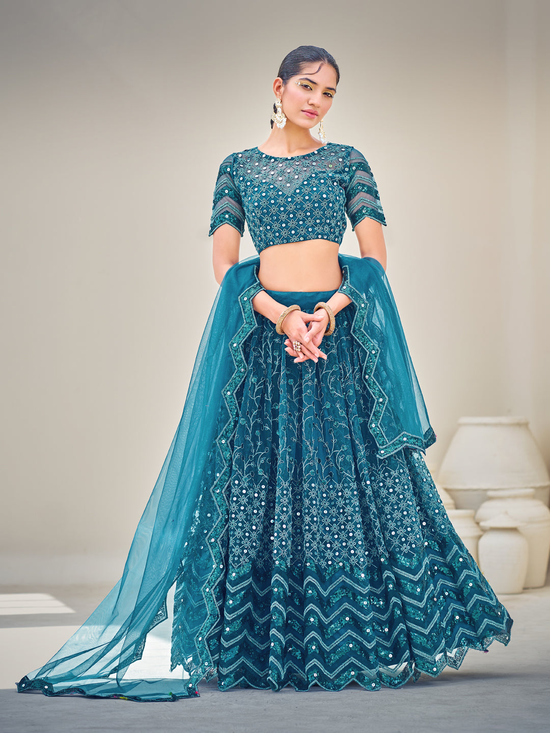 Blue Embroidered Sequined Semi-Stitched Lehenga Choli