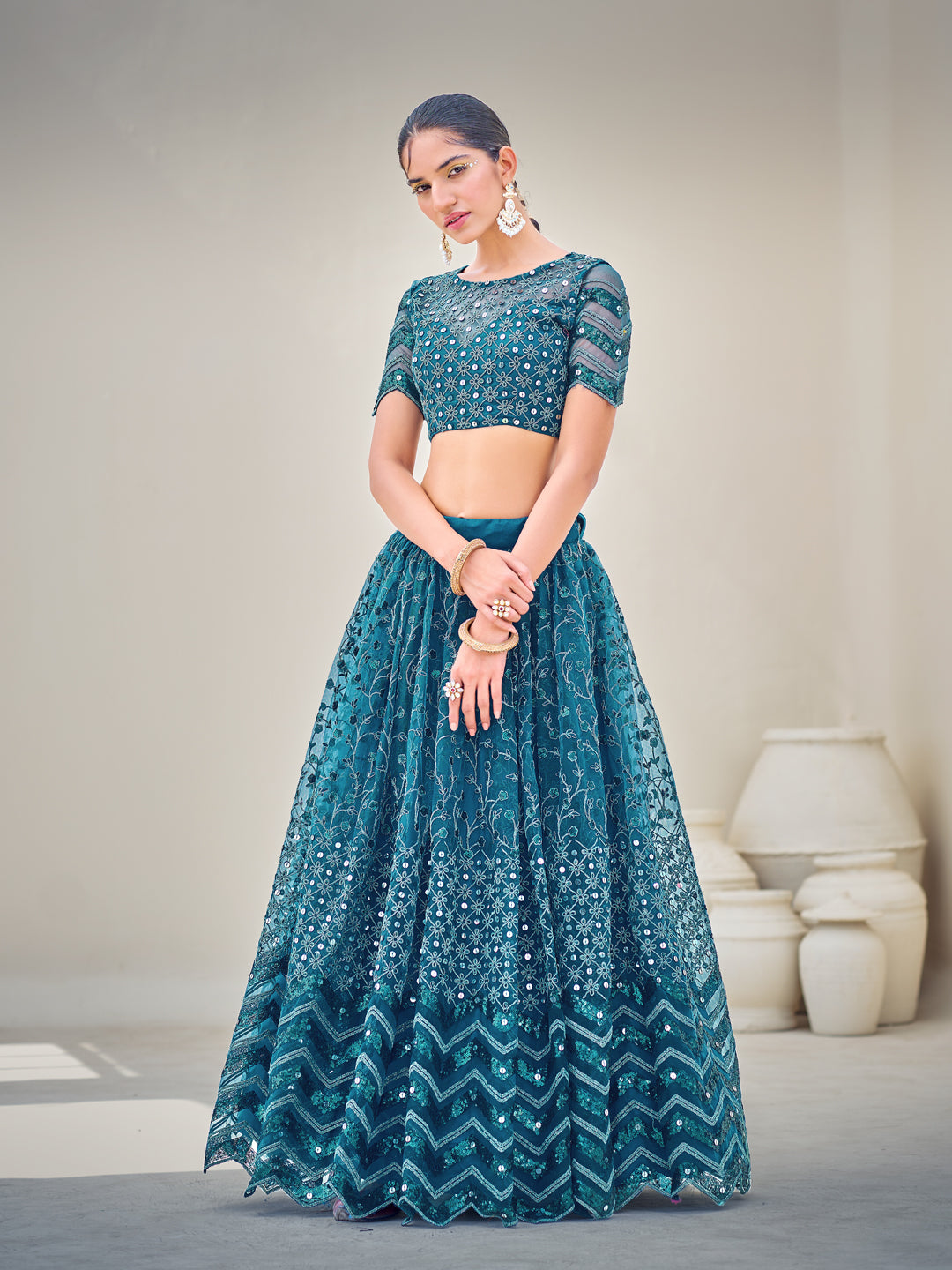 Blue Embroidered Sequined Semi-Stitched Lehenga Choli