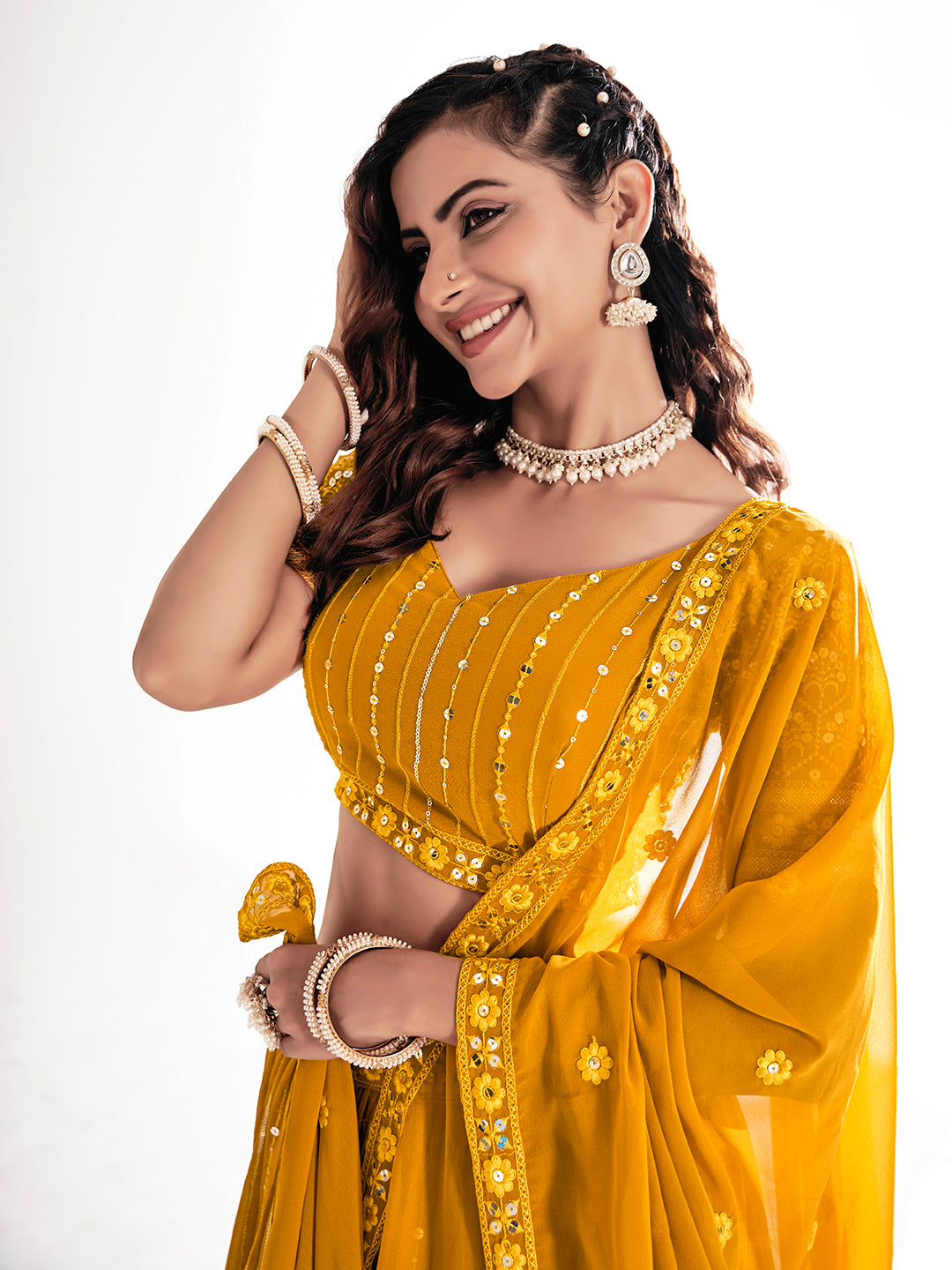 Mustard Yellow Sequins Embroidered Net Lehenga Choli