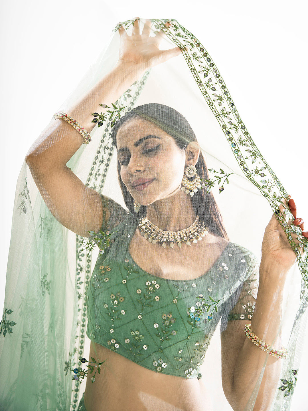 Pista Green Sequins Embroidered Net Lehenga Choli