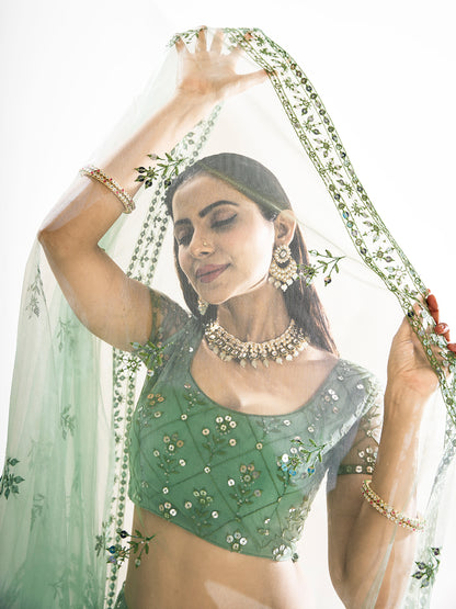 Pista Green Sequins Embroidered Net Lehenga Choli