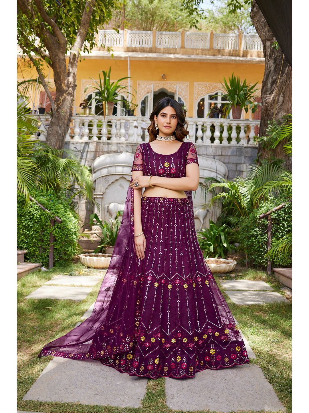Purple Sequins Embroidered Net Lehenga Choli