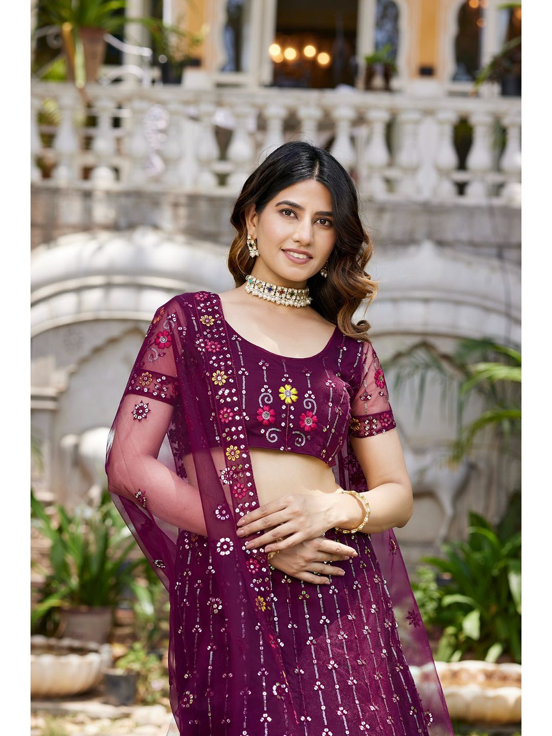 Purple Sequins Embroidered Net Lehenga Choli