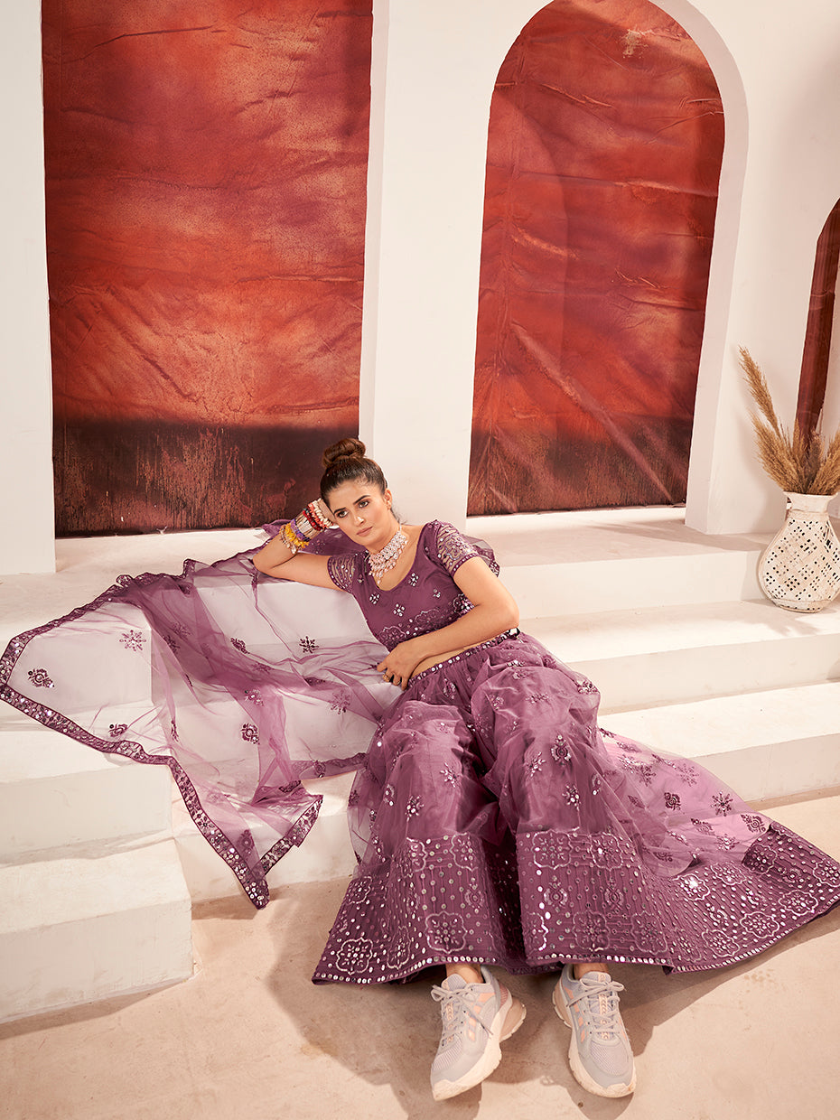 Prettiest Mauve Soft Net Sequins Embroidered Lehenga Choli