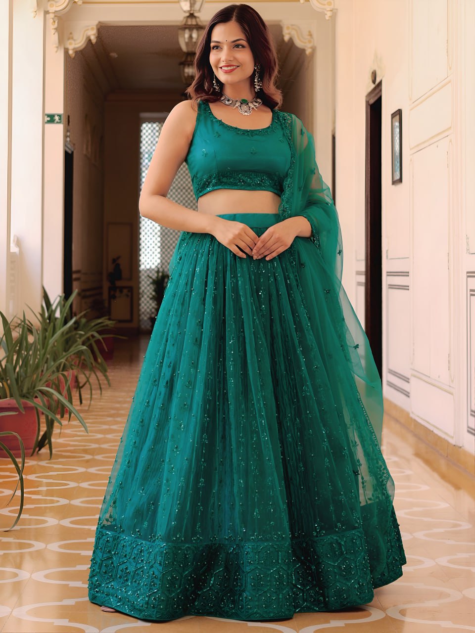 Teal Green Thread, Sequins and Pearl Embroidered Party Wear Lehenga Choli