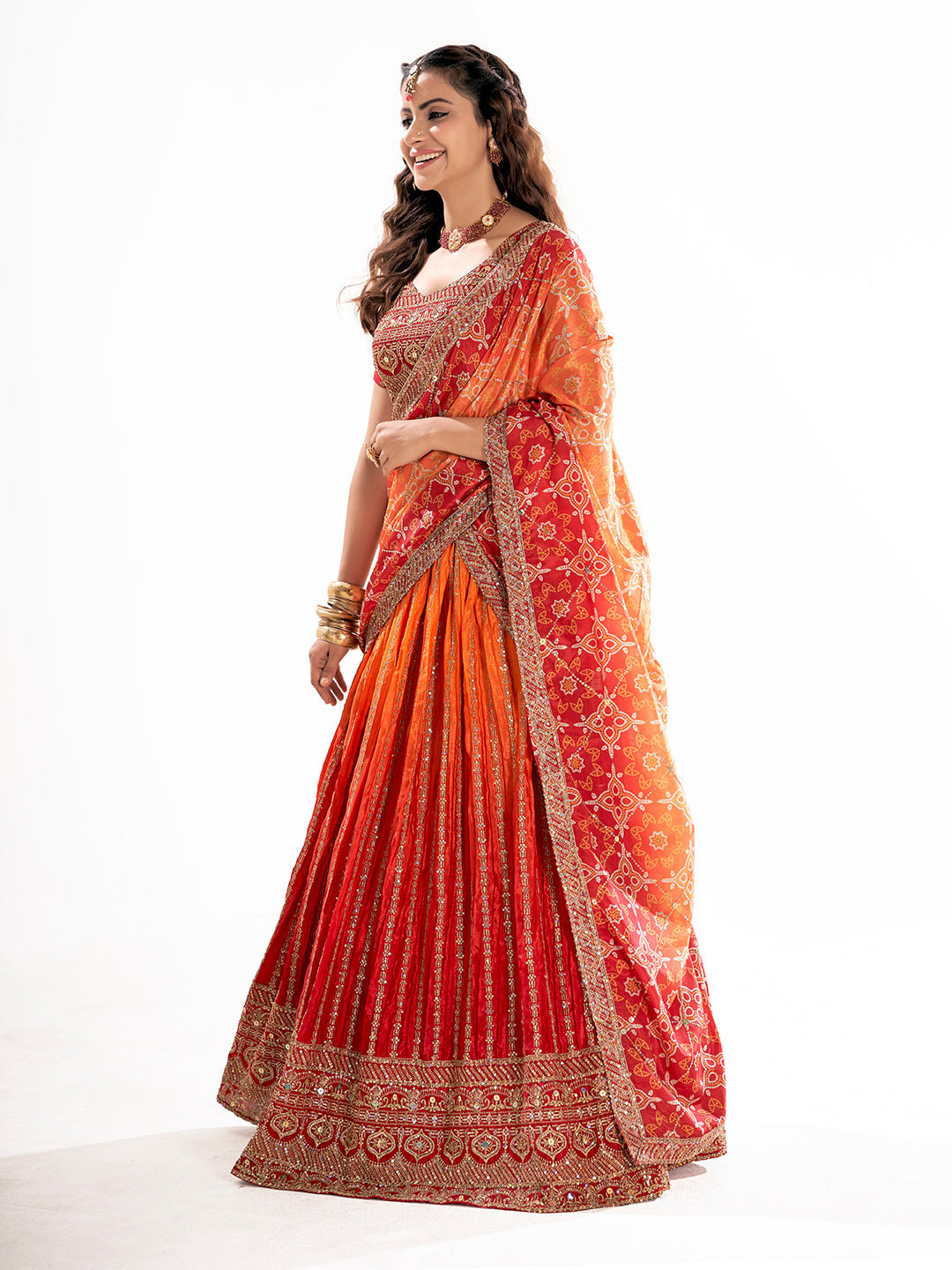 Orange Embroidered Sequined Semi-Stitched Lehenga Choli