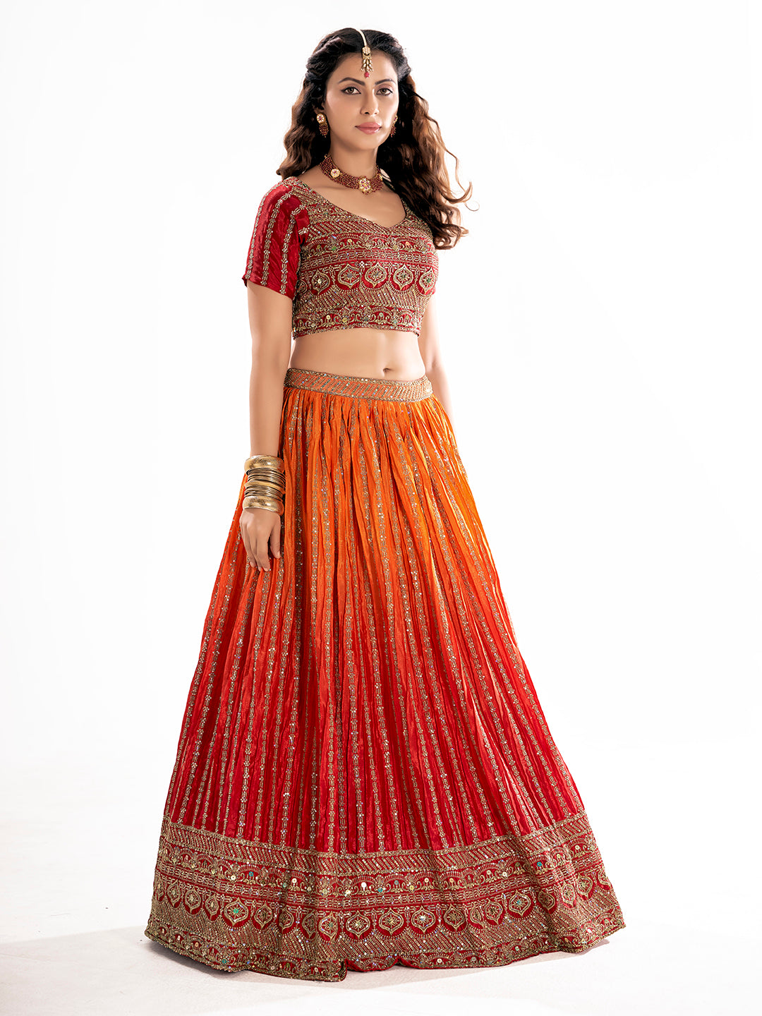 Orange Embroidered Sequined Semi-Stitched Lehenga Choli