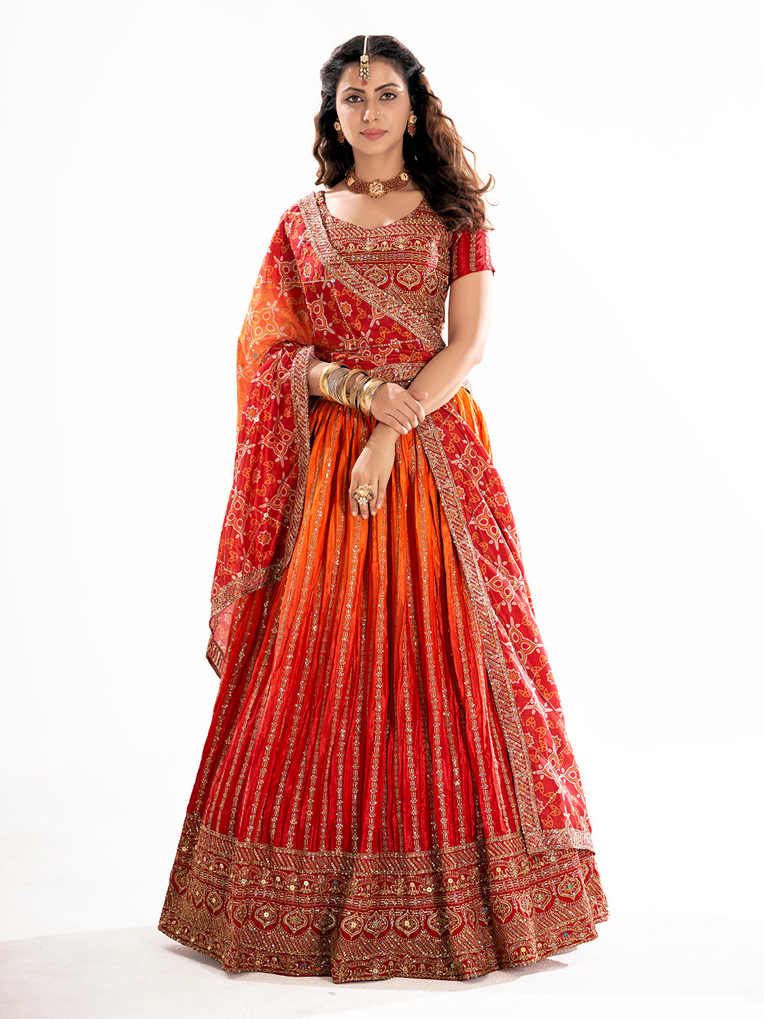 Orange Embroidered Sequined Semi-Stitched Lehenga Choli