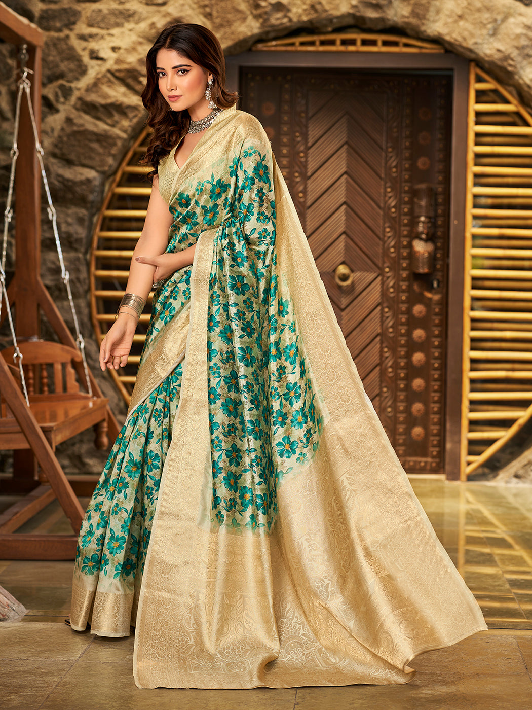 Gorgeous Sea Green Color Saree With Floral Patterns Design .