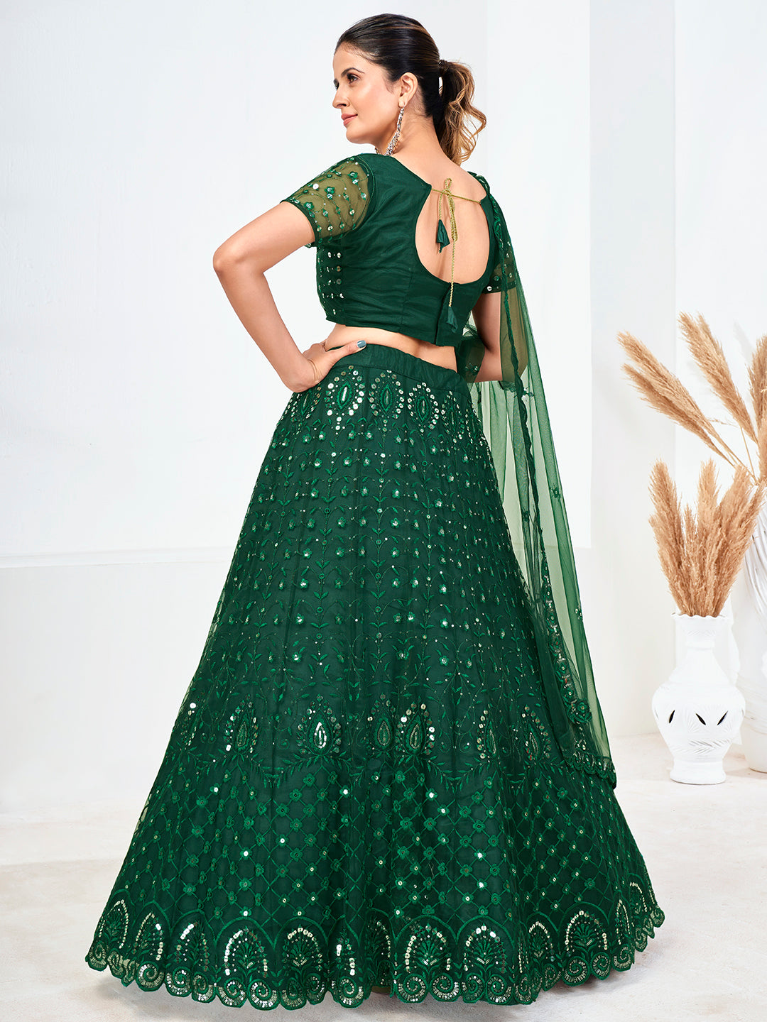 Green Sequins Embroidered Soft Net Festival Special Lehenga Choli