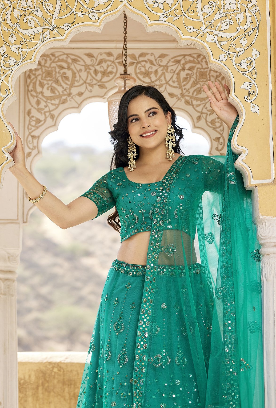 Rama Blue Sequins Embroidered Net Lehenga Choli