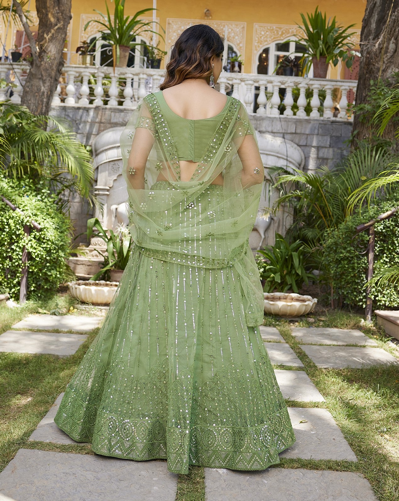 Pista Green Sequins Embroidered Net Lehenga Choli