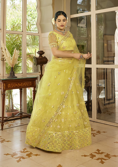 Light Yellow Sequins Embroidered Net Lehenga Choli