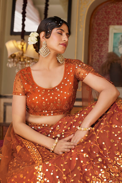 Orange Soft Net Sequins Embroidered Lehenga Choli