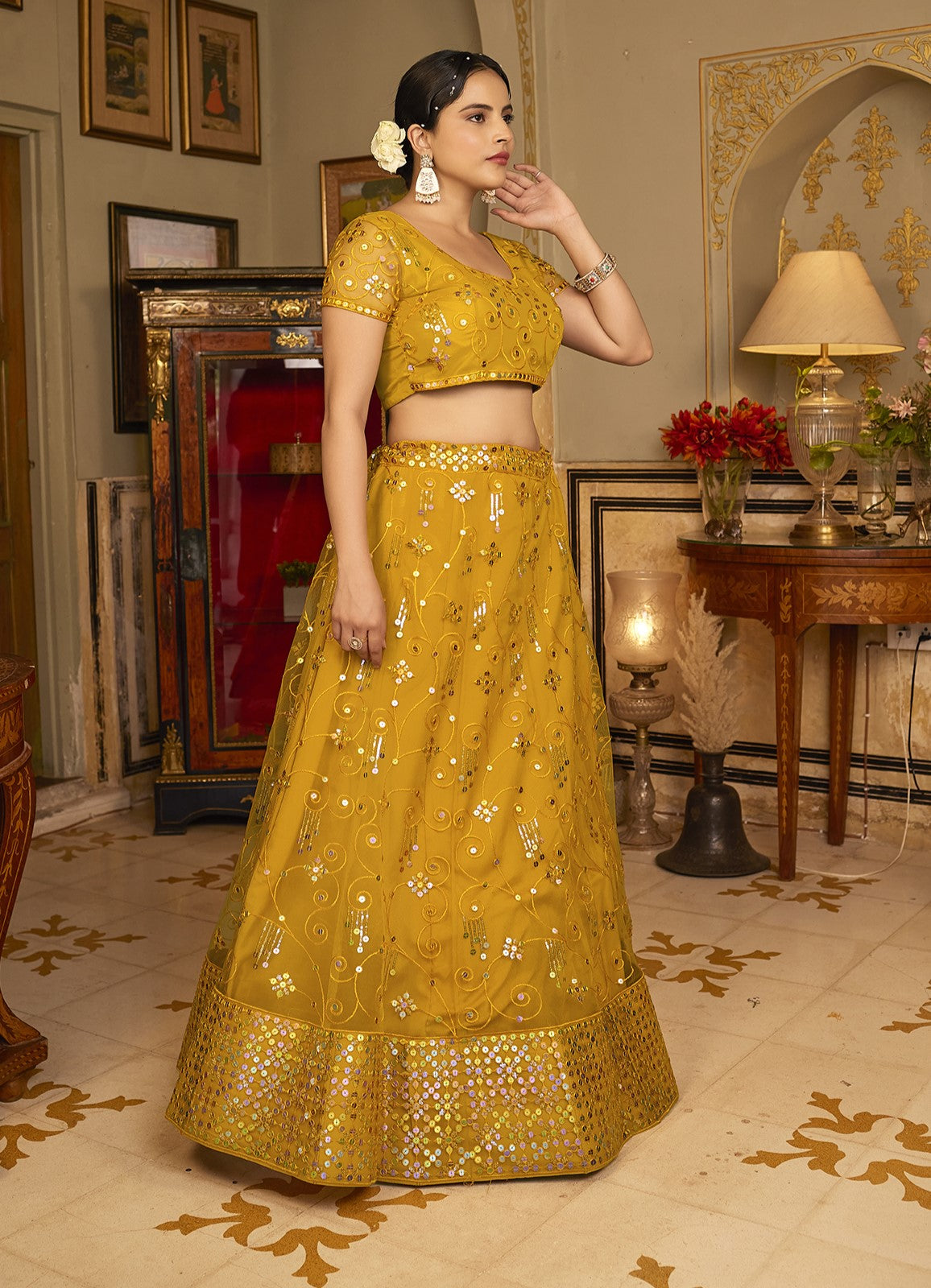 Deep Yellow Sequins Embroidered Net Lehenga Choli