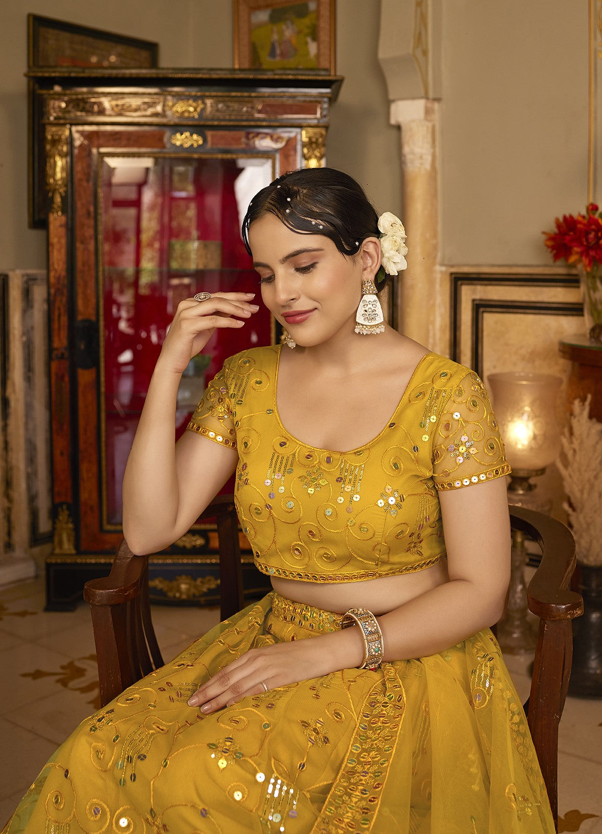 Deep Yellow Sequins Embroidered Net Lehenga Choli