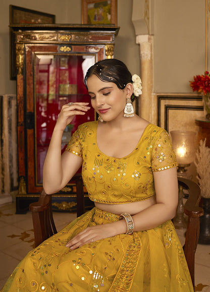 Deep Yellow Sequins Embroidered Net Lehenga Choli