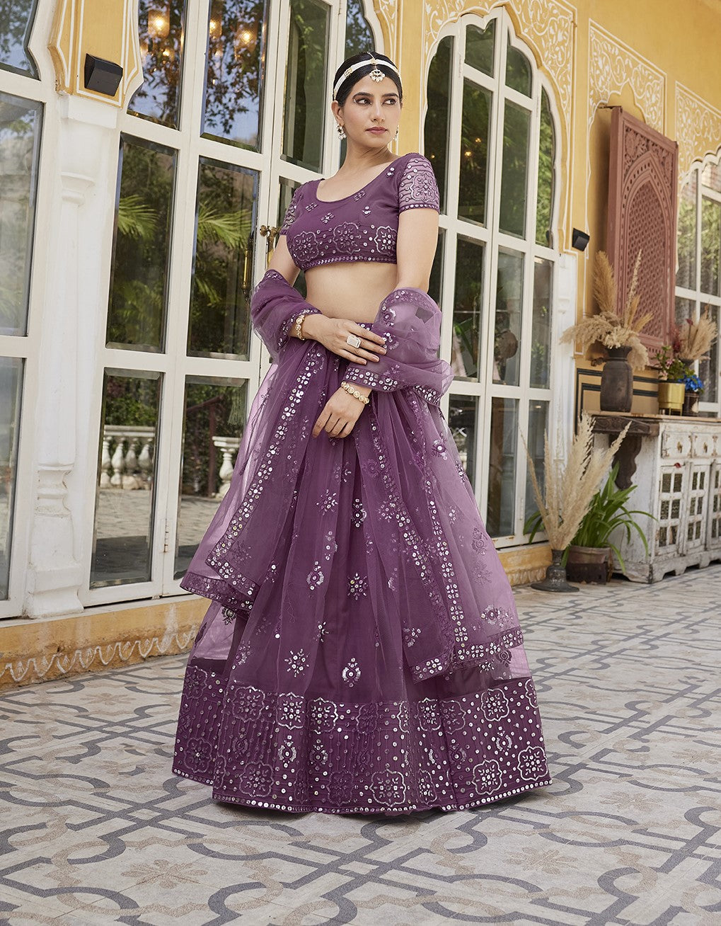 Mauve Soft Net Sequins Embroidered Lehenga Choli