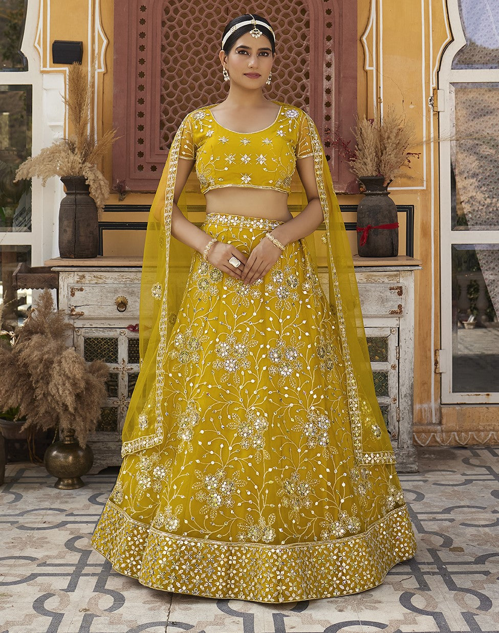 Mustard Yellow Sequins Embroidered Net Lehenga Choli