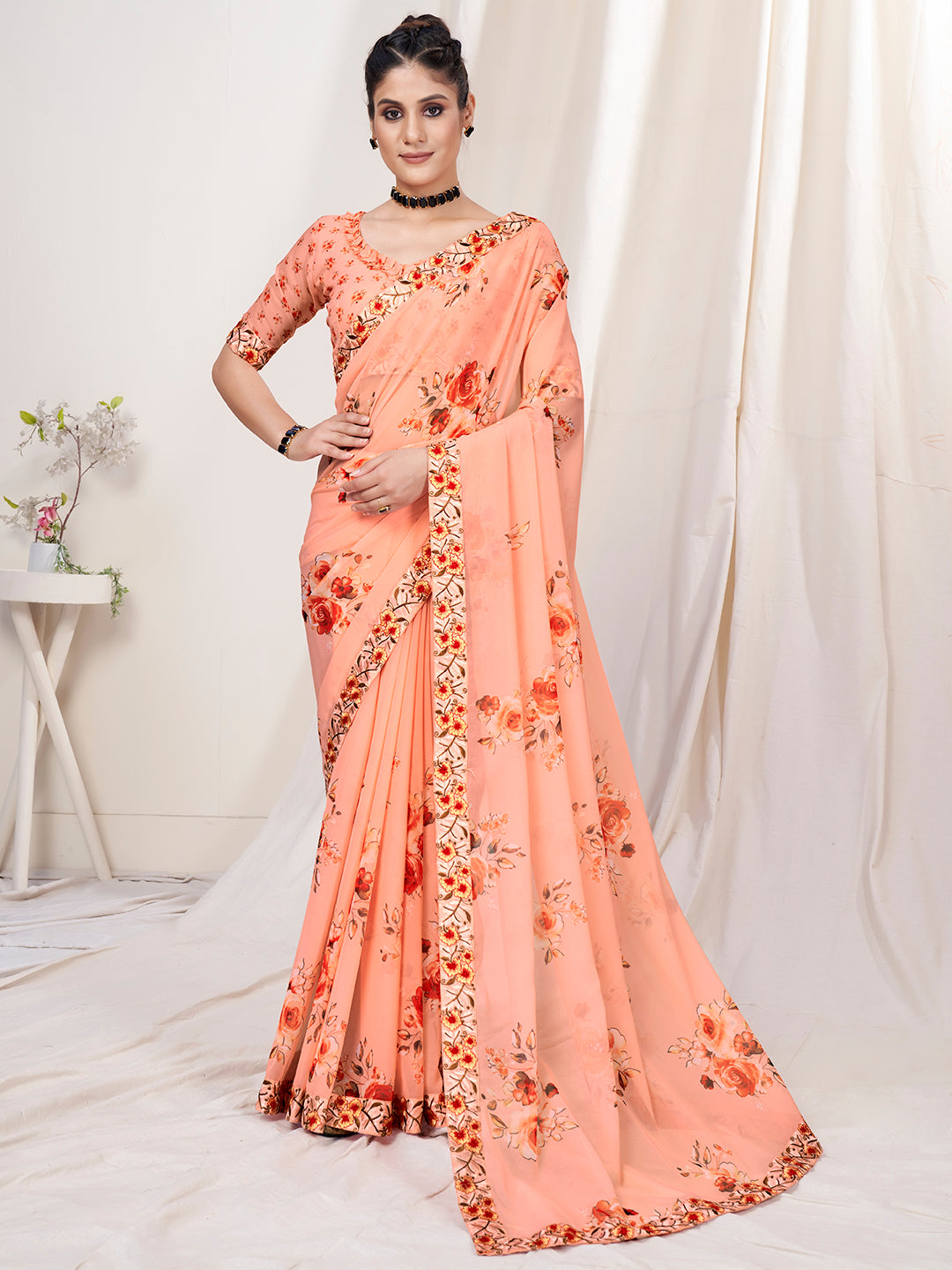 Pastel Orange Floral Designer Georgette Saree