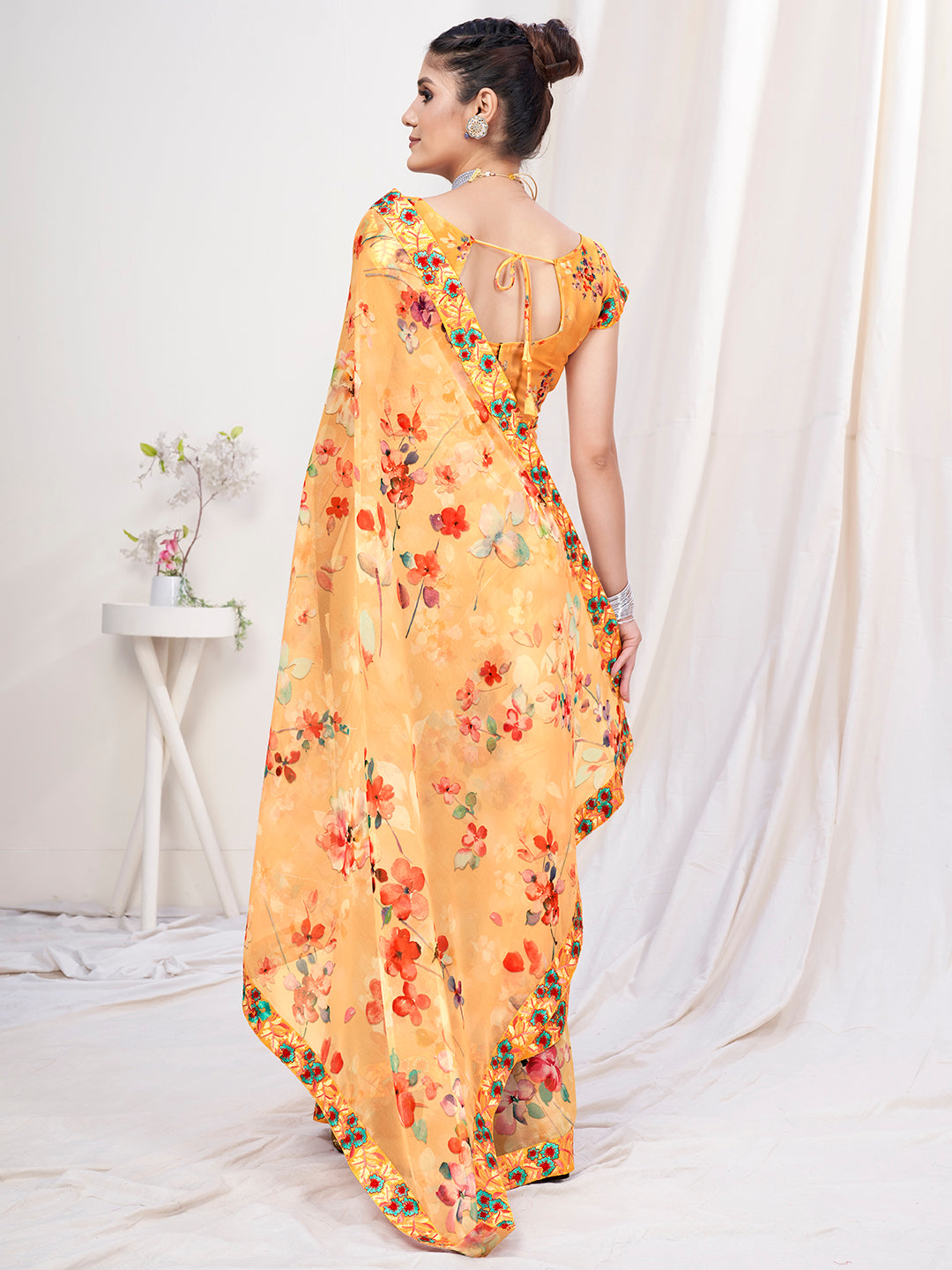Light Orange Floral Designer Georgette Saree