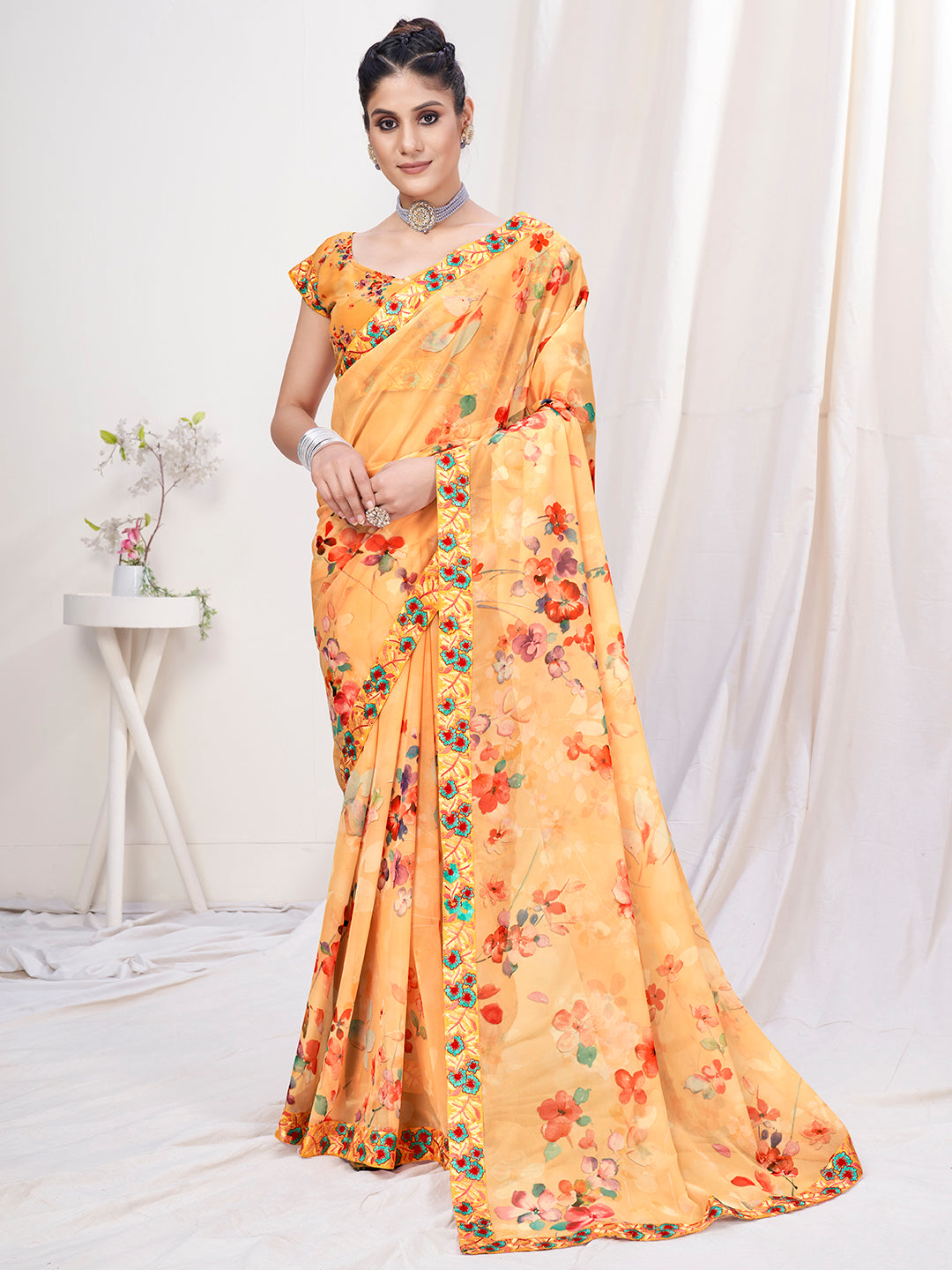 Light Orange Floral Designer Georgette Saree