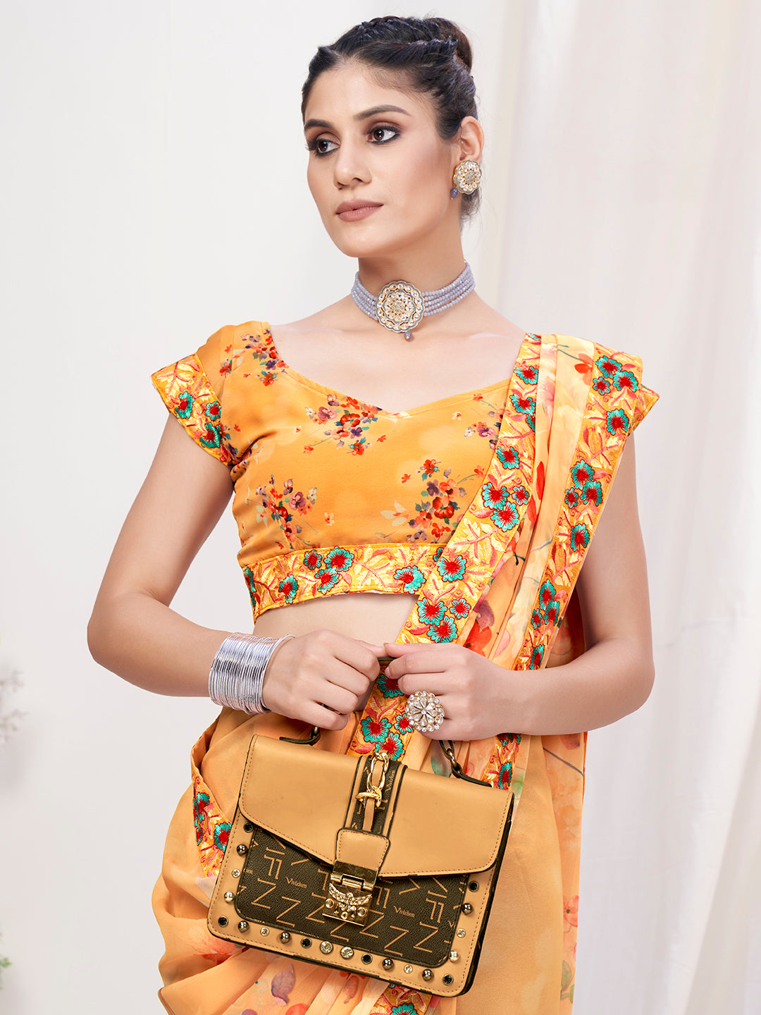 Light Orange Floral Designer Georgette Saree