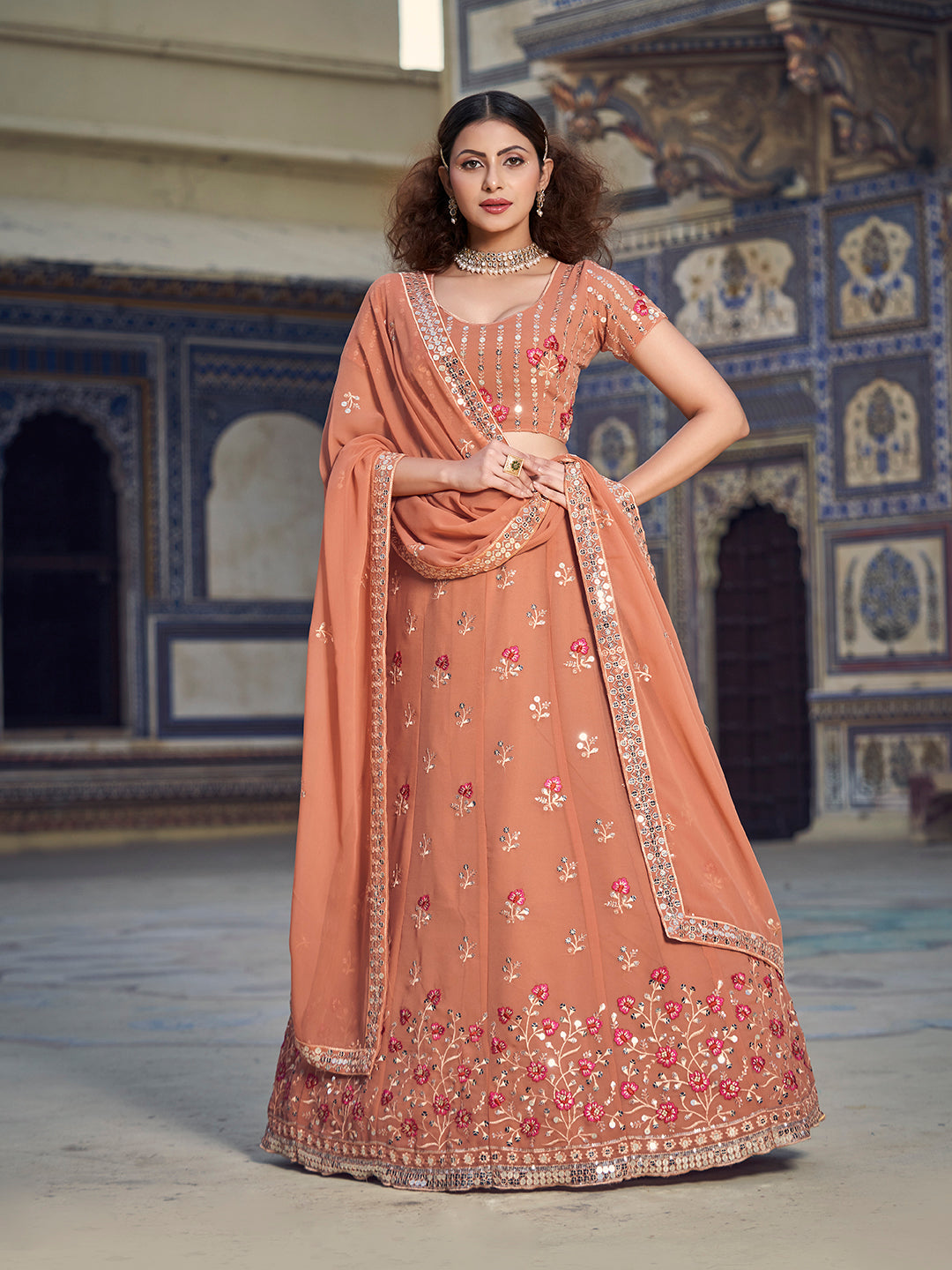 Light Rust Sequence Embroidered Georgette Lehenga Choli