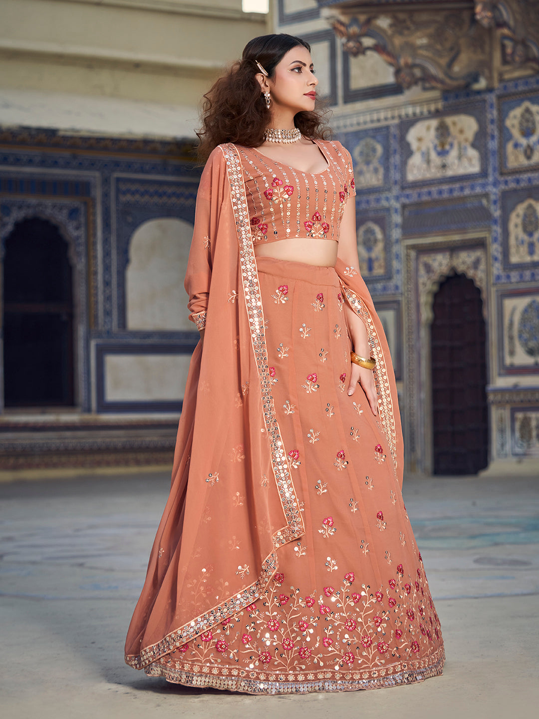 Light Rust Sequence Embroidered Georgette Lehenga Choli