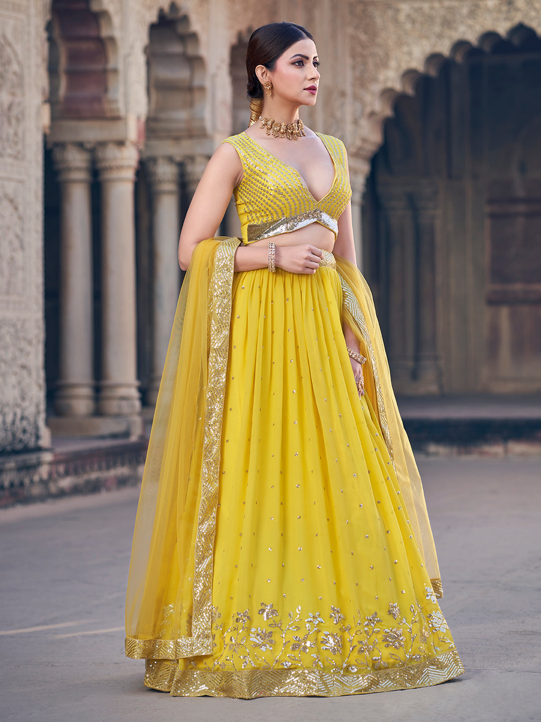 Enchanting Corn Yellow Sequence Embroidered Georgette Lehenga Choli