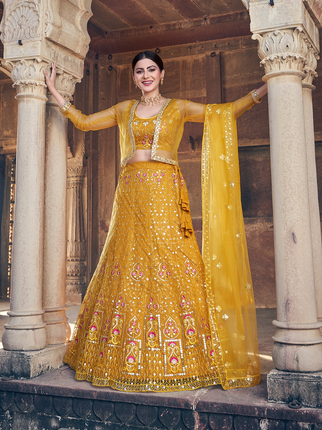 Desirable Mustard Yellow Soft Net Sequence Embroidered Eid Special Lehenga Choli