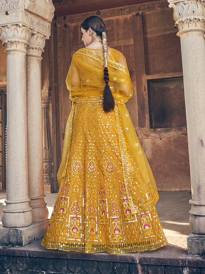 Desirable Mustard Yellow Soft Net Sequence Embroidered Eid Special Lehenga Choli