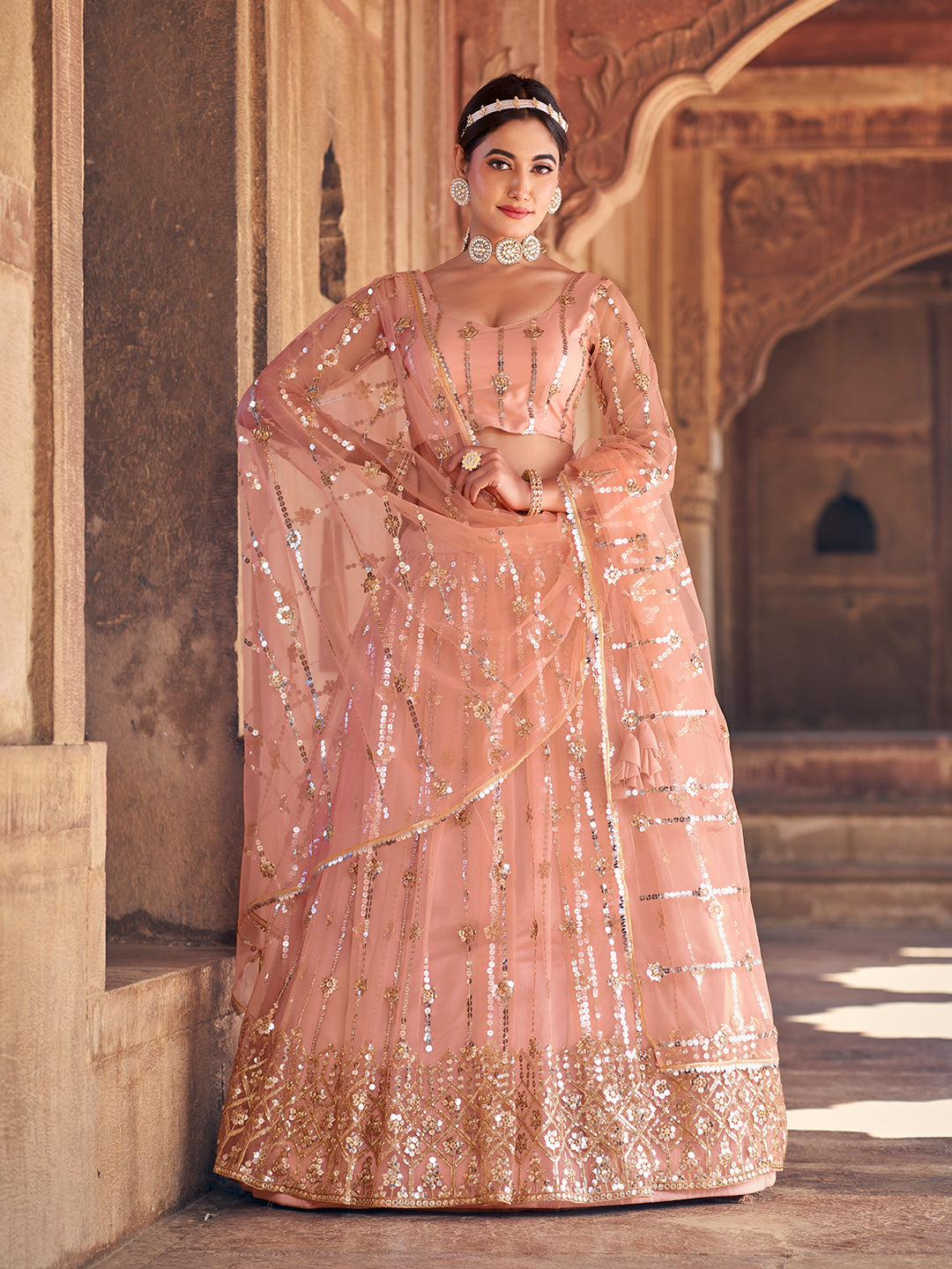 Lovely Peach Color Sequence Embroidered Soft Net Lehenga Choli Set For Women