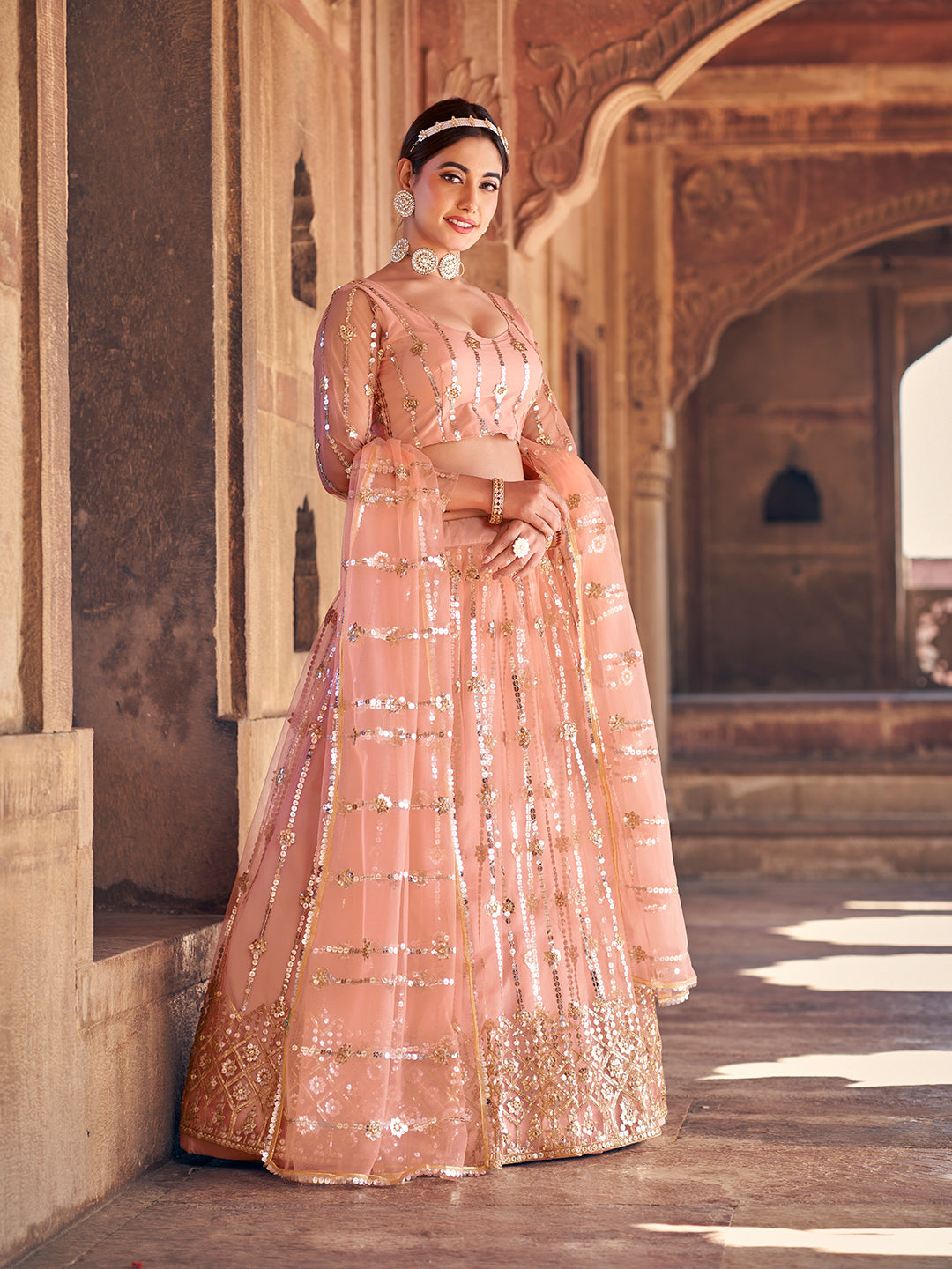 Lovely Peach Color Sequence Embroidered Soft Net Lehenga Choli Set For Women