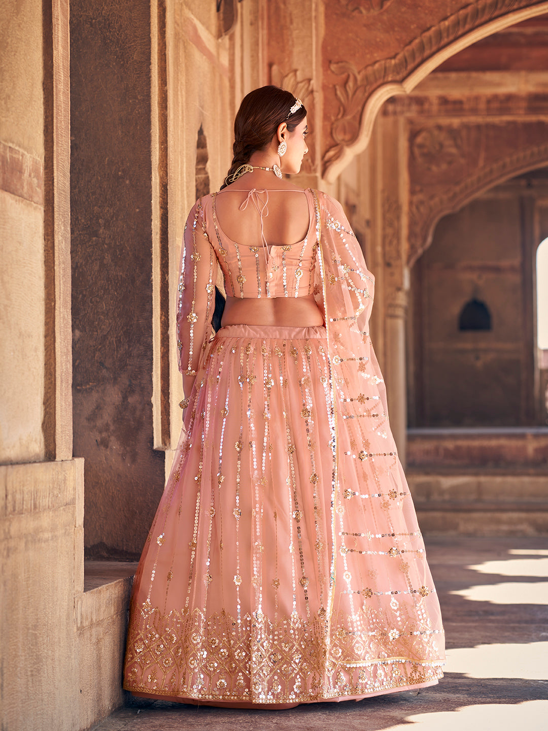 Lovely Peach Color Sequence Embroidered Soft Net Lehenga Choli Set For Women