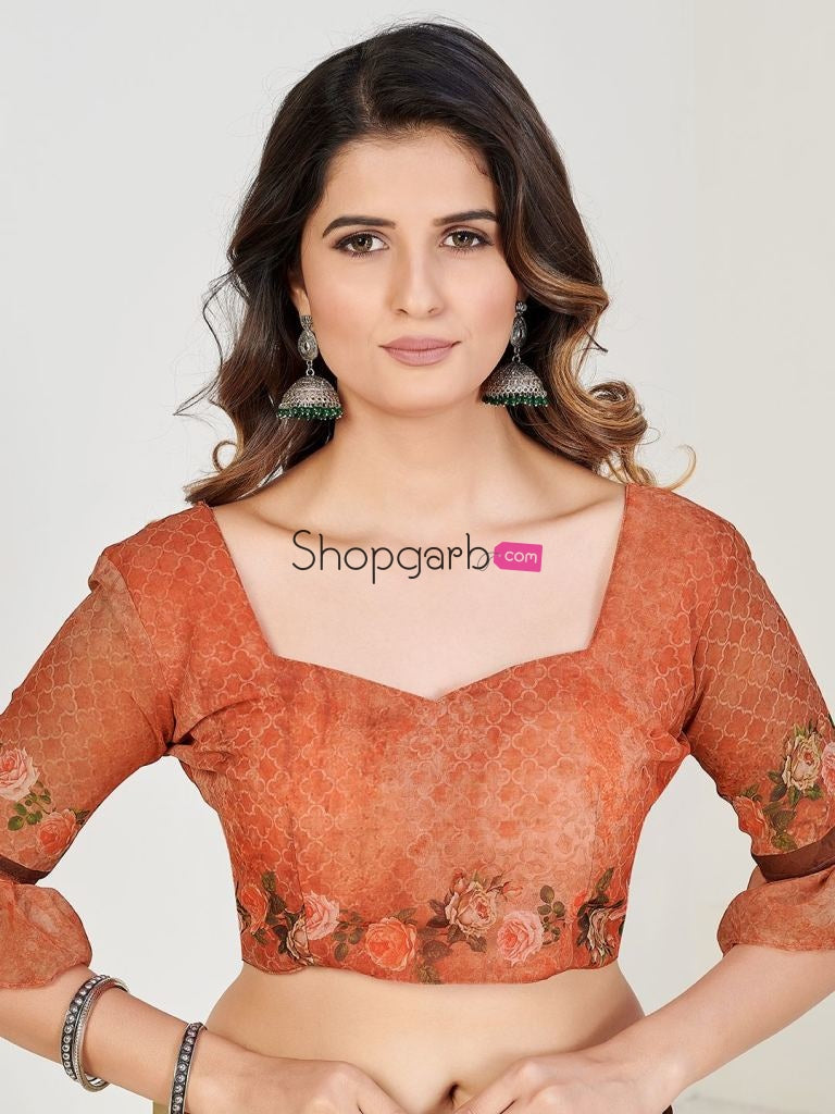Stylish Beige And Brown Georgette Floral Printed Casual Wear Saree With Blouse