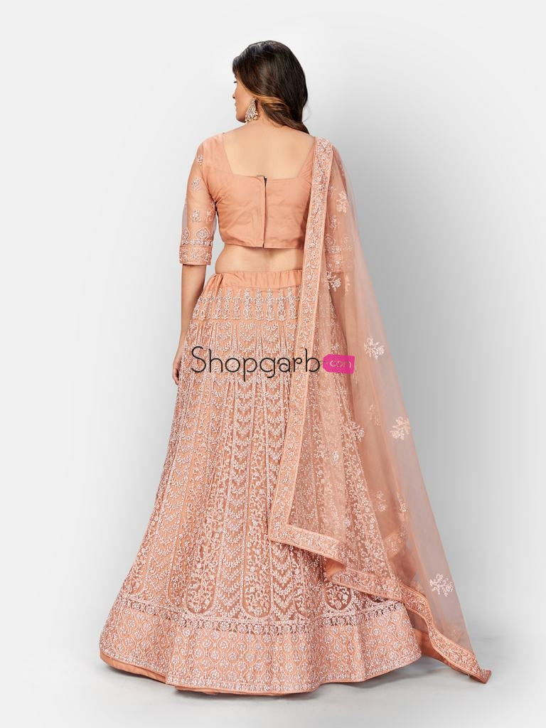 Stylish Rose Gold Soft Net Embroidered Wedding Wear Lehenga Choli With Dupatta