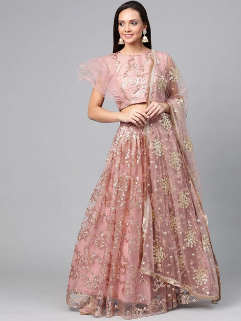 Woman Pink & Golden Color Solid Semi-Stitched Lehenga Unstitched Blouse With Dupatta