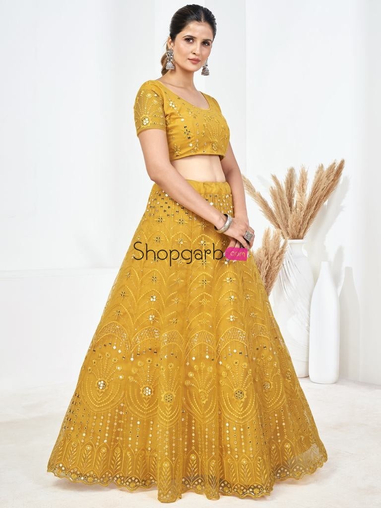 Yellow Sequins Embroidered Soft Net Festival Special Lehenga Choli
