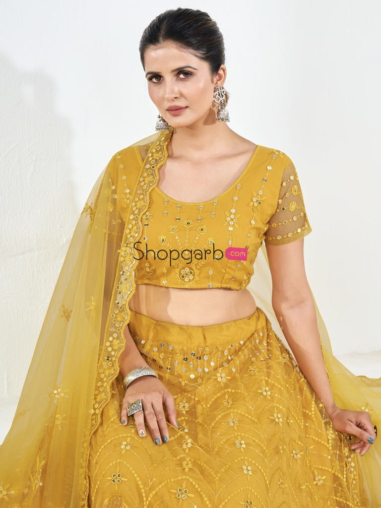 Yellow Sequins Embroidered Soft Net Festival Special Lehenga Choli